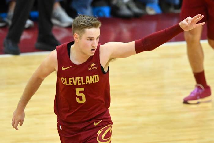 Dec 20, 2023; Cleveland, Ohio, USA; Cleveland Cavaliers guard Sam Merrill (5) celebrates his three-point basket in the fourth quarter against the Utah Jazz at Rocket Mortgage FieldHouse.
